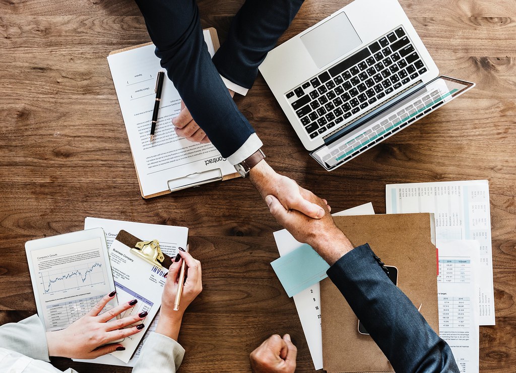 Business partners signing a contract