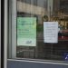 Closed sign on a business door after deregistration